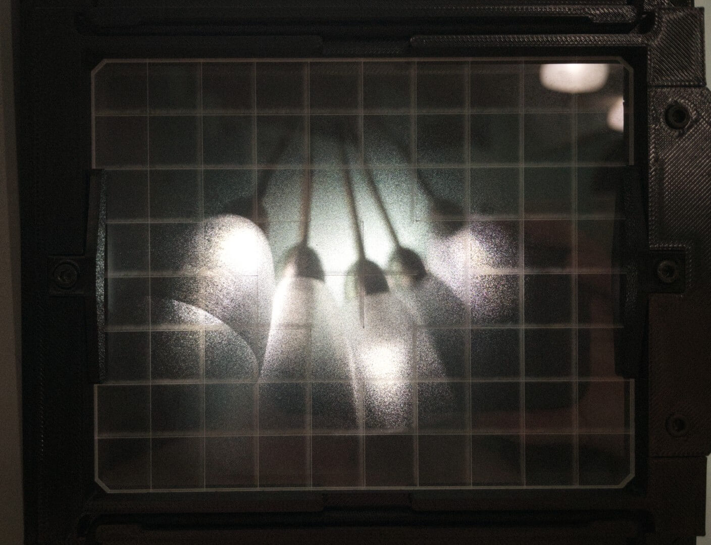 Fresnel lens on top of ground glass in daylight